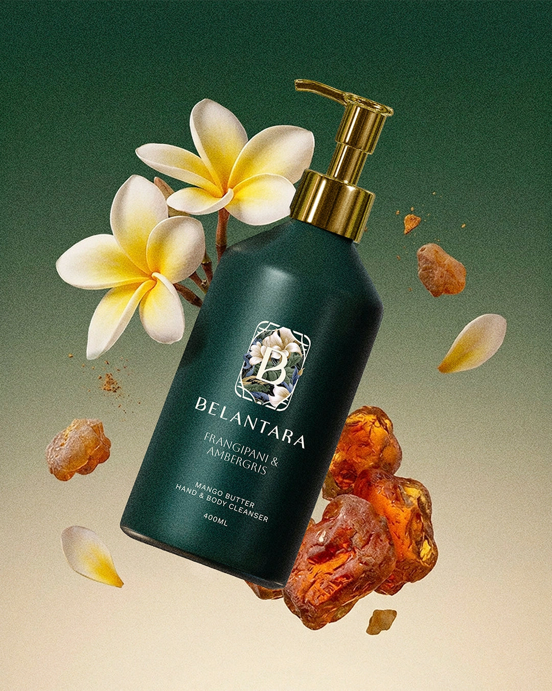 Belantara frangipani & ambergris hand & body cleanser with flowers and amber crystals on a dark green gradient background.