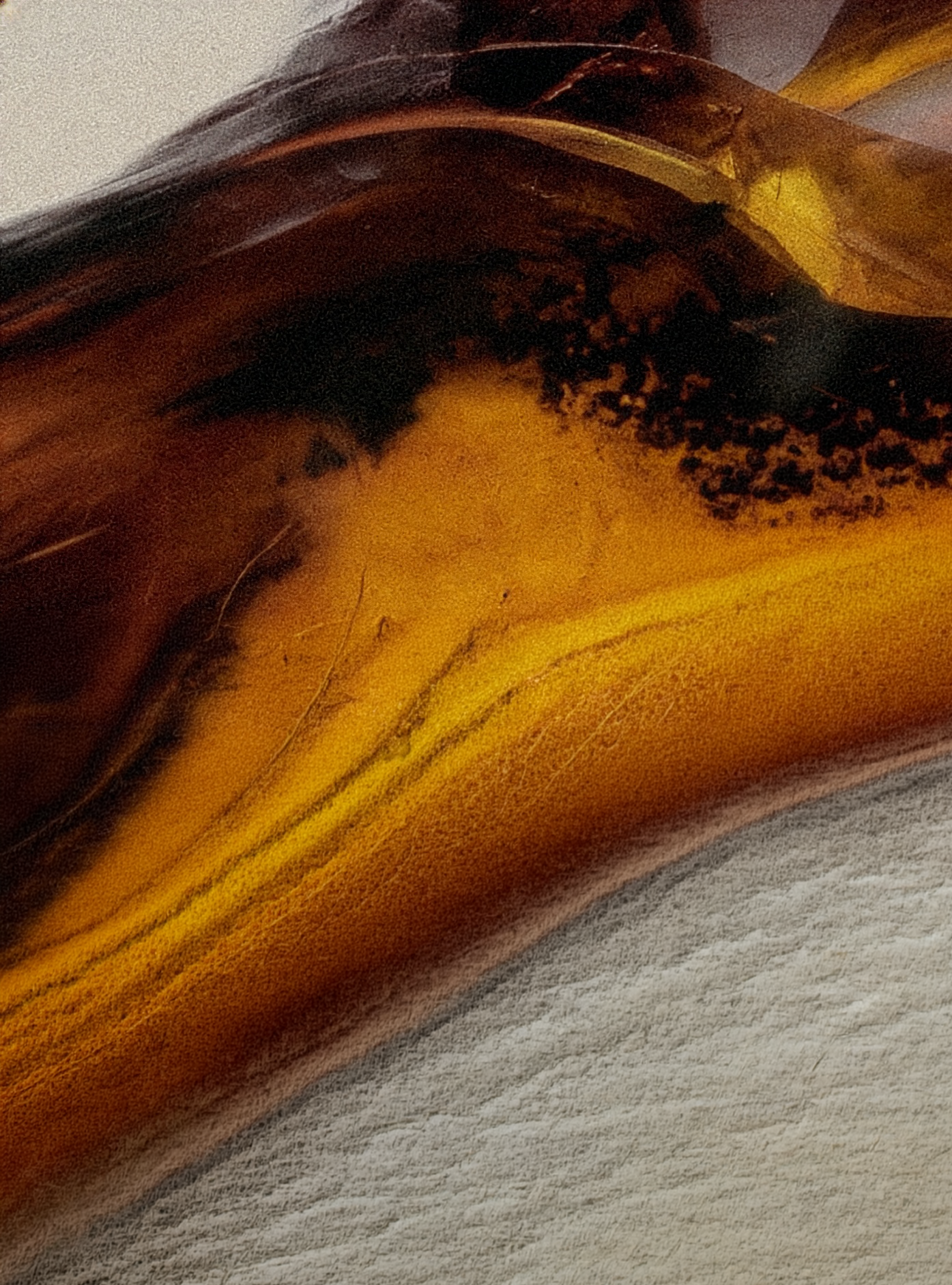 Close-up of amber on a gray background