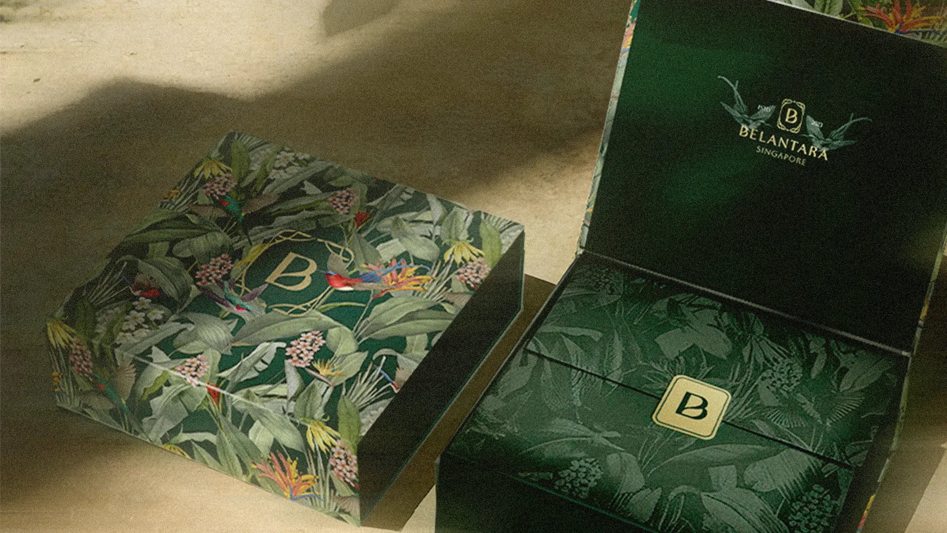 Green floral-patterned box with the Belantara logo on a beige surface.